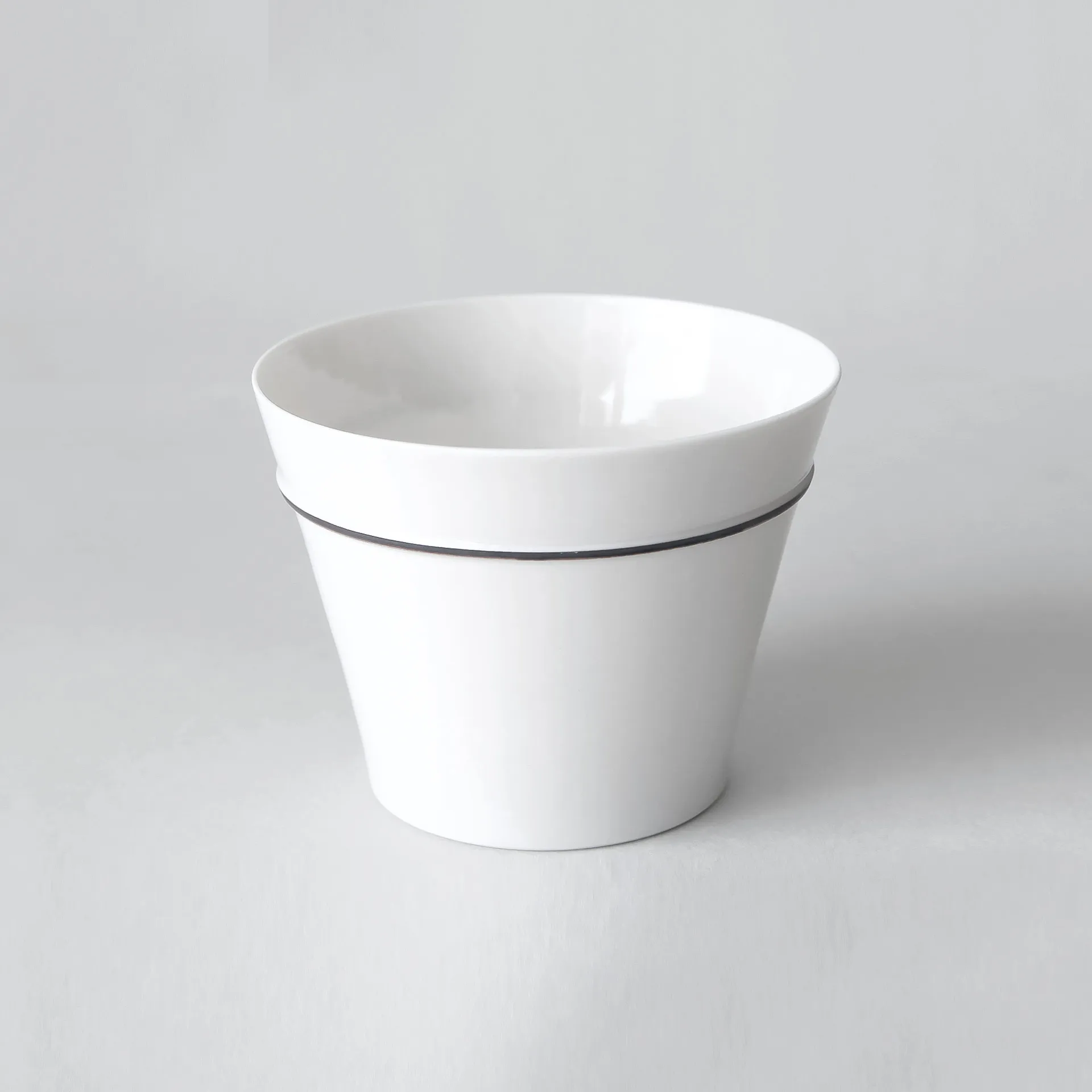 White porcelain cup with iron line